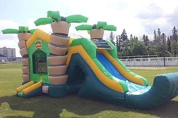 Tropical bouncy castle with slide